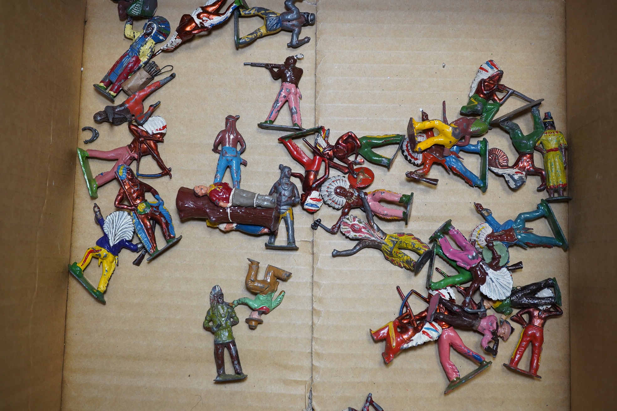 A collection of Hollowcast lead figures to include soldiers, Cowboys, Red Indians. Condition - poor to fair